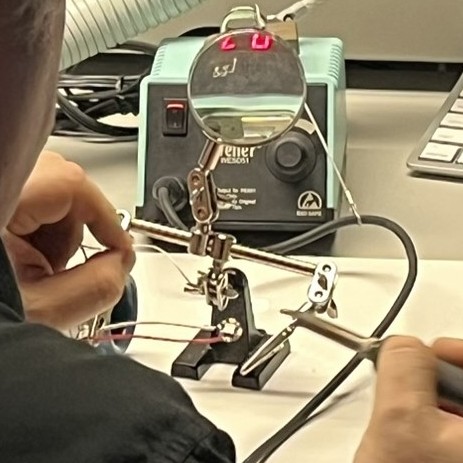 Step 2/3/4/5: Wait for the iron to heat up, warm the point of contact, melt solder material and finally, add solder to join the two pieces together.